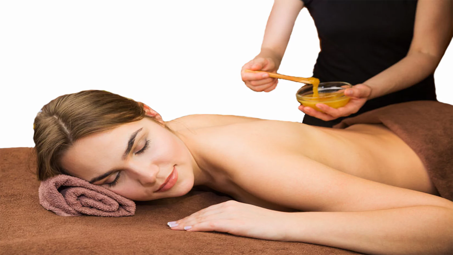 Bild einer jungen Frau bei einer Honig - Massage.